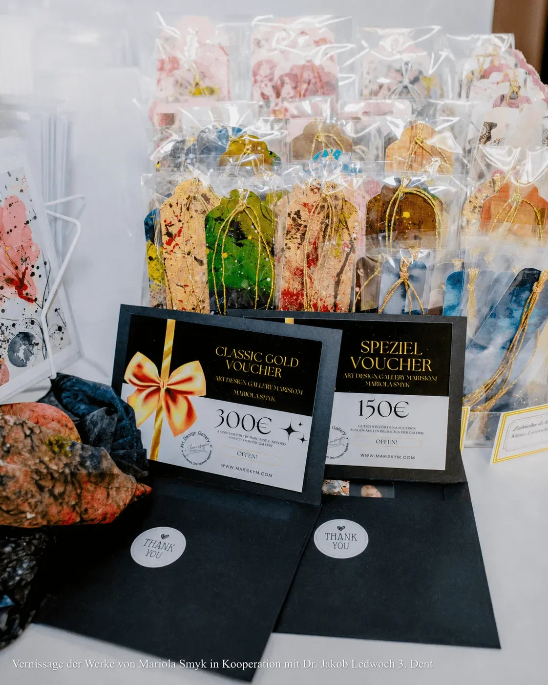 Assortment of Acrylic Art, Pouring Artwork, Textile Design Products, Apaszki Scarves, and Pareo in Gallery Showcase